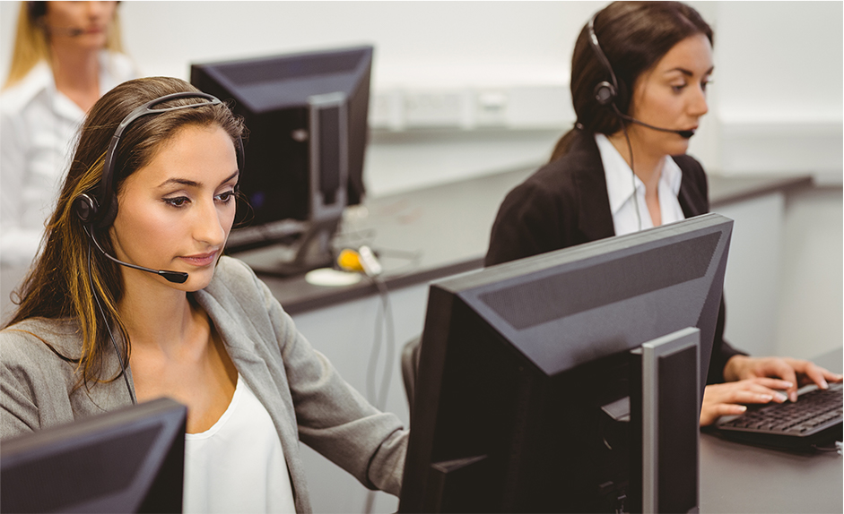 Woman on headset at call center